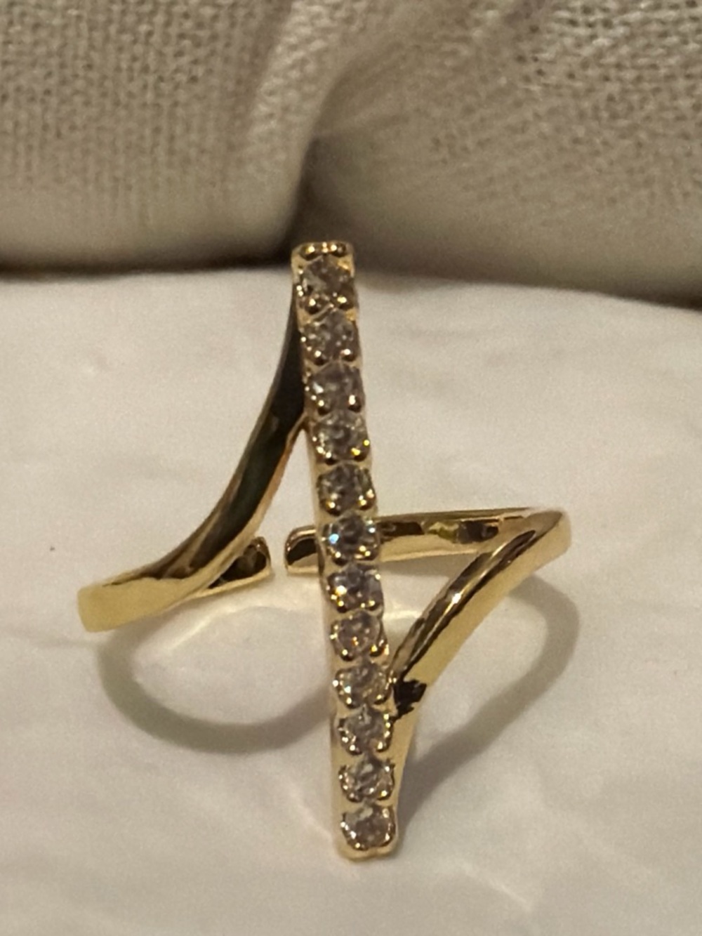 Gold ring with diamond-like stones